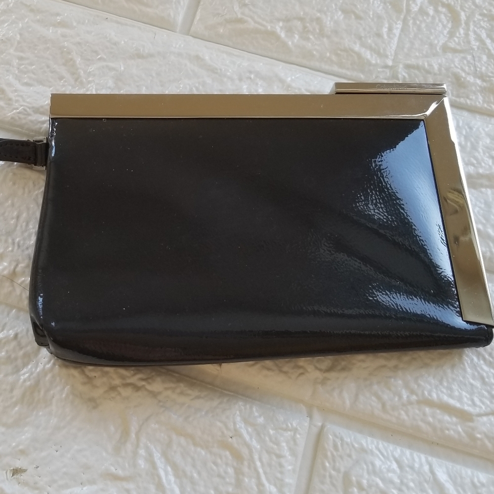 Calvin Klein patent leather wristlet